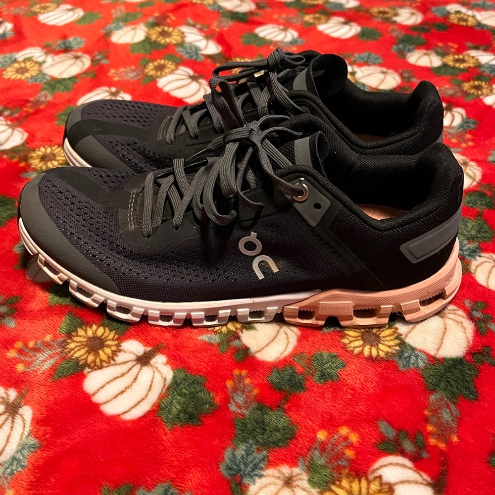On Running Black and Pink Athletic Shoes with CloudTec Technology